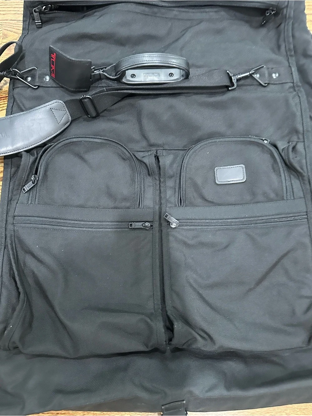 Tumi Black Travel Garment Bag with Dual Front Pockets and Shoulder Strap